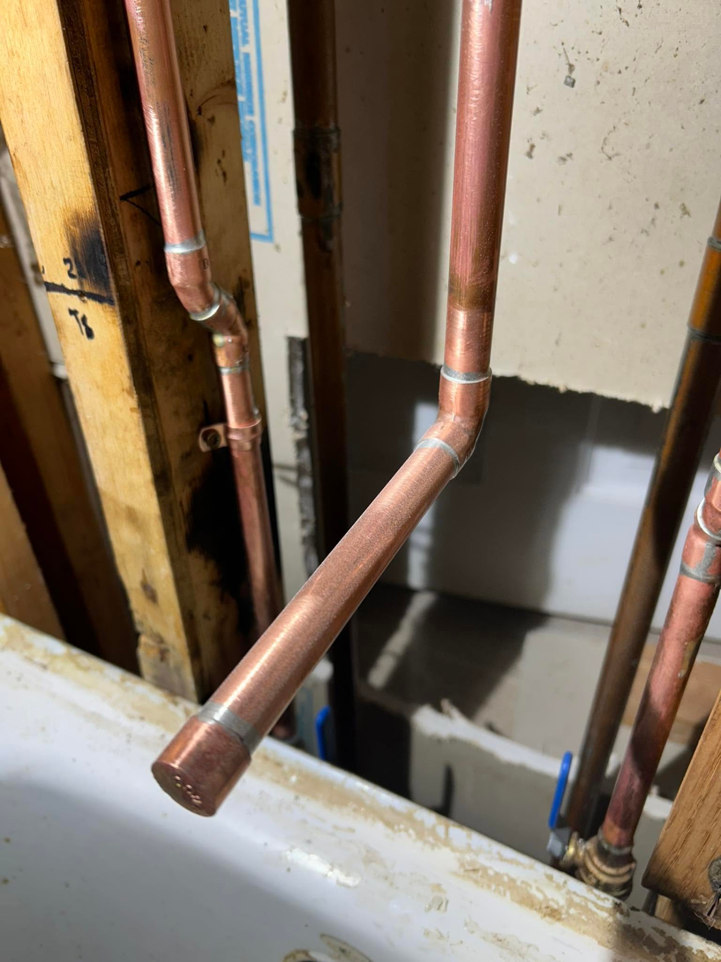New copper water line rough-in with clean soldered joints