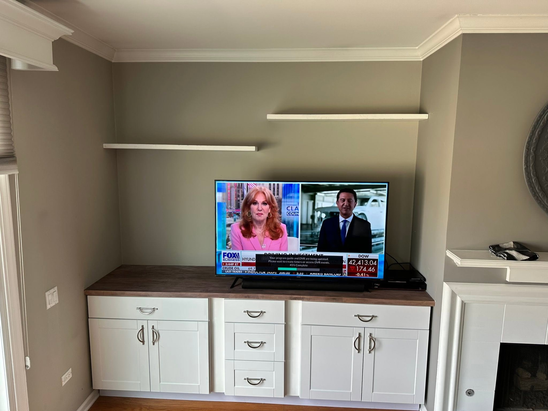 Custom built-in cabinetry and shelving with butcher-block top