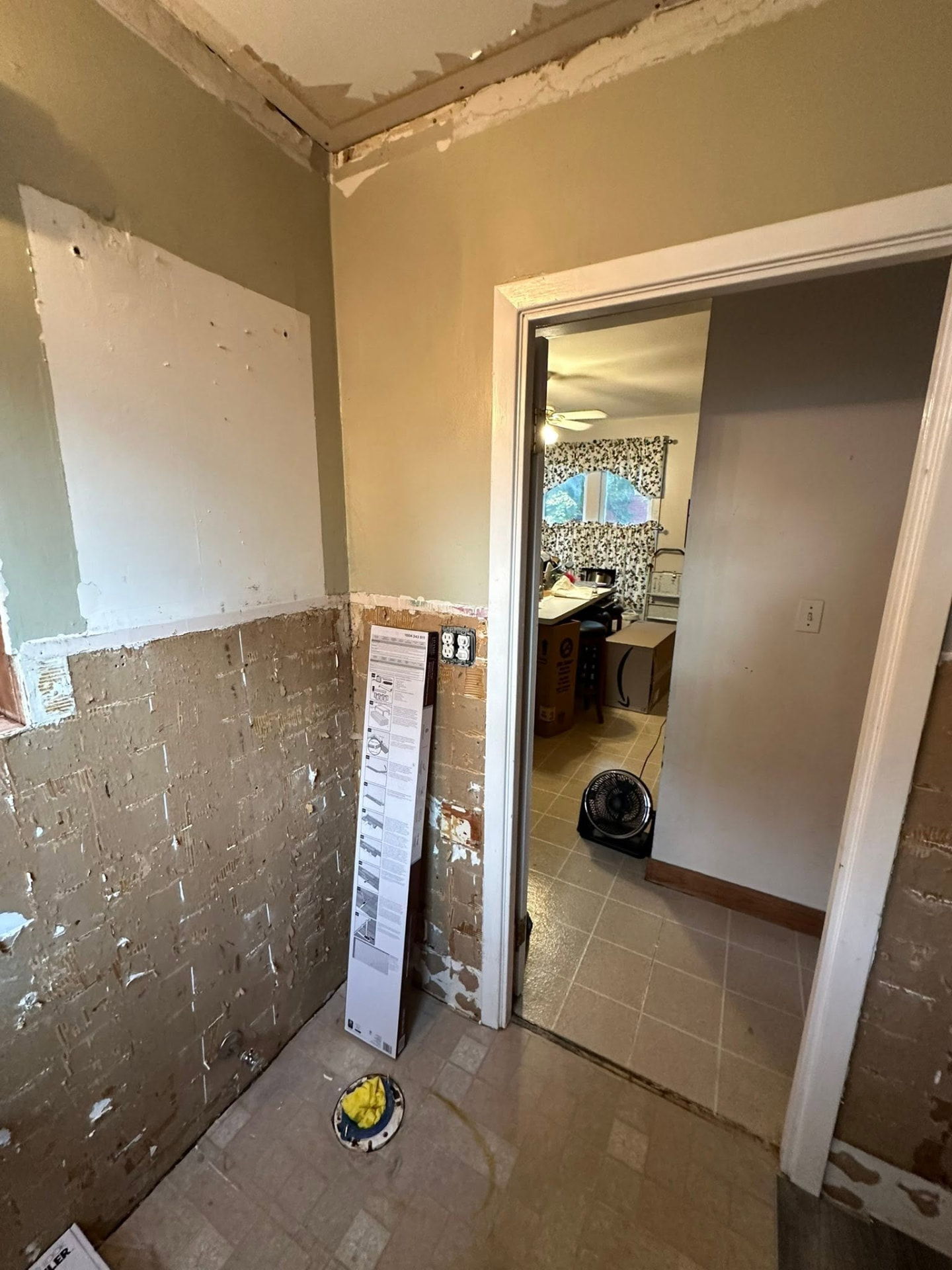 Bathroom demolition in progress before new finishes and fixtures