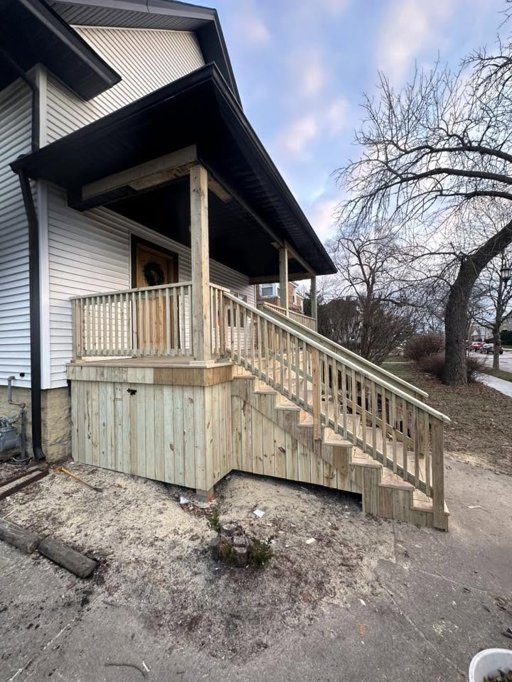 New front porch deck with full staircase and railing system