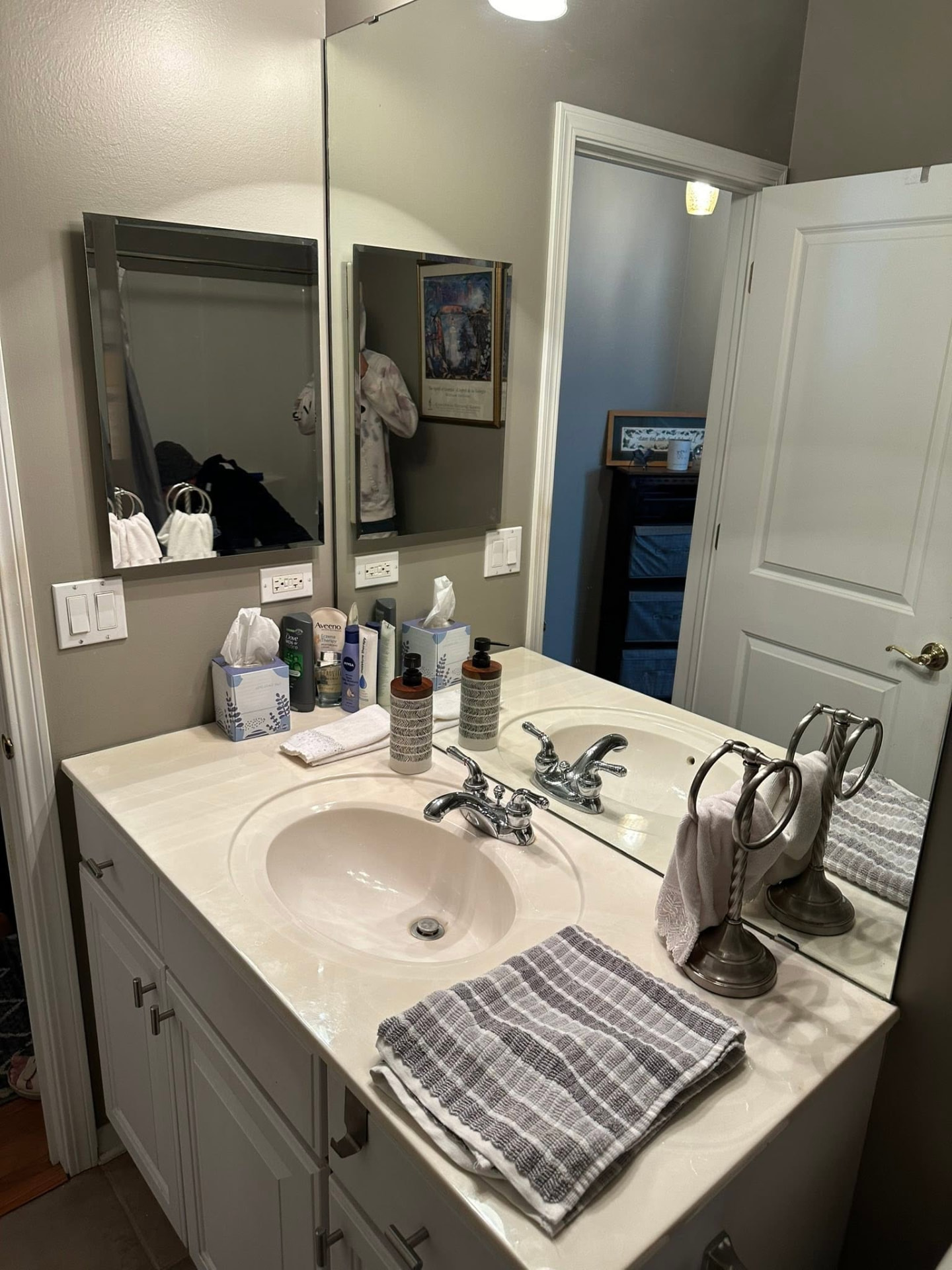 Bathroom vanity, mirror and countertop before an update