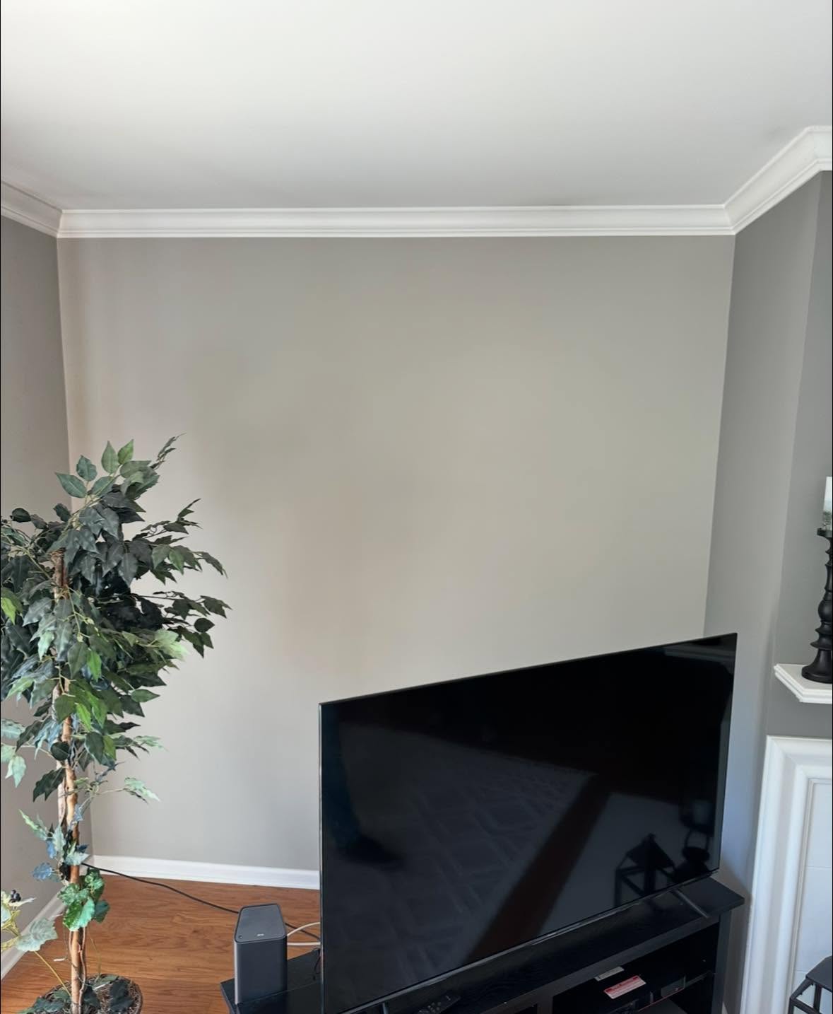 Crown molding and repainted walls in a finished living space